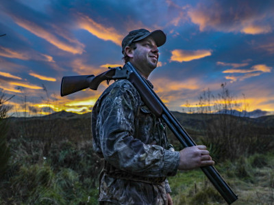 Dr Phil Lavretsky waits for incoming birds during a sunset hunt in Canterbury4.
