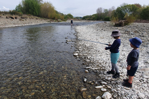 WFR2122.06 School holiday fun for Blake and Mackenzie Dyson on a tributary of the Opihi River Credit Chris Dyson
