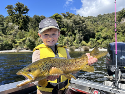 Harrison finding success on Lake Brunner with a woolly bugger in choppy conditions.