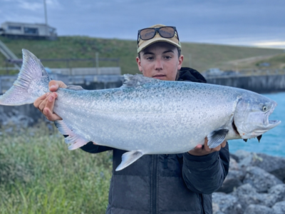 WFR2526.155 Connor Cavaney with an excellent chinook salmon from the Pūkaki canal, kept for the smoker.