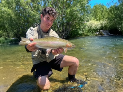 lds WFR2526.100 Josh Gilber (16yo) with a healthy rainbow trout from the Lower Ōhau River.
