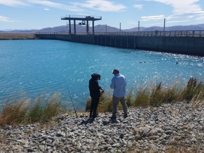 WFR1819.39 An angler gets checked at the Ohau C Canal