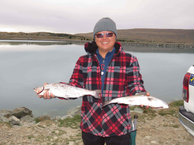 WFR1819.06 Jeff Zhao with a pair of salmon from the Tekapo Canal