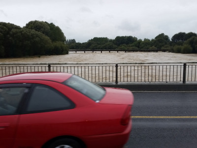 WFR1718.41The flooded Temuka River flows at about 530 cumecs at SH110am on February 21