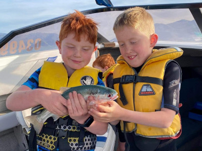 WFR2223.24 Harley Stone and Ollie Salisbury with Ollies first ever trout caught trolling at Lake Benmore