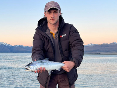 WFR2324.24 Blake Harper with a 2.5lbs salmon from Lake Tekapo Takapo Photo by Cameron Smith