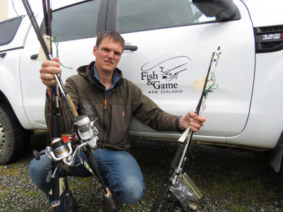 Photo 1 CSIFG Central South Island Fish Game Compliance Coordinator Hamish Stevens with the rods seized over Labour Weekend