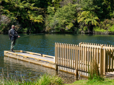 TRL1April 202 Curly McEwen tries his luck from the Lake Mangamahoe casting platform photo Charmian Stancliff 1