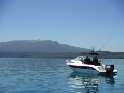 Anglers taking on some fine summer weather L Tarawera