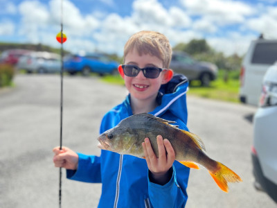 TRL1Dec21. Benjamin Litre shows of a good sized perch. Photo Jose Litre