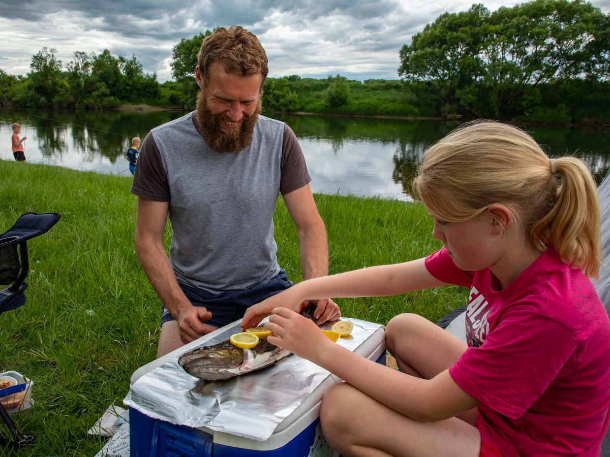 Jacob and Lucy prepare trout