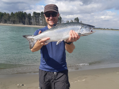 Photo 1 Scott Pearson with a 6.5 pound salmon caught at the Waimakariri
