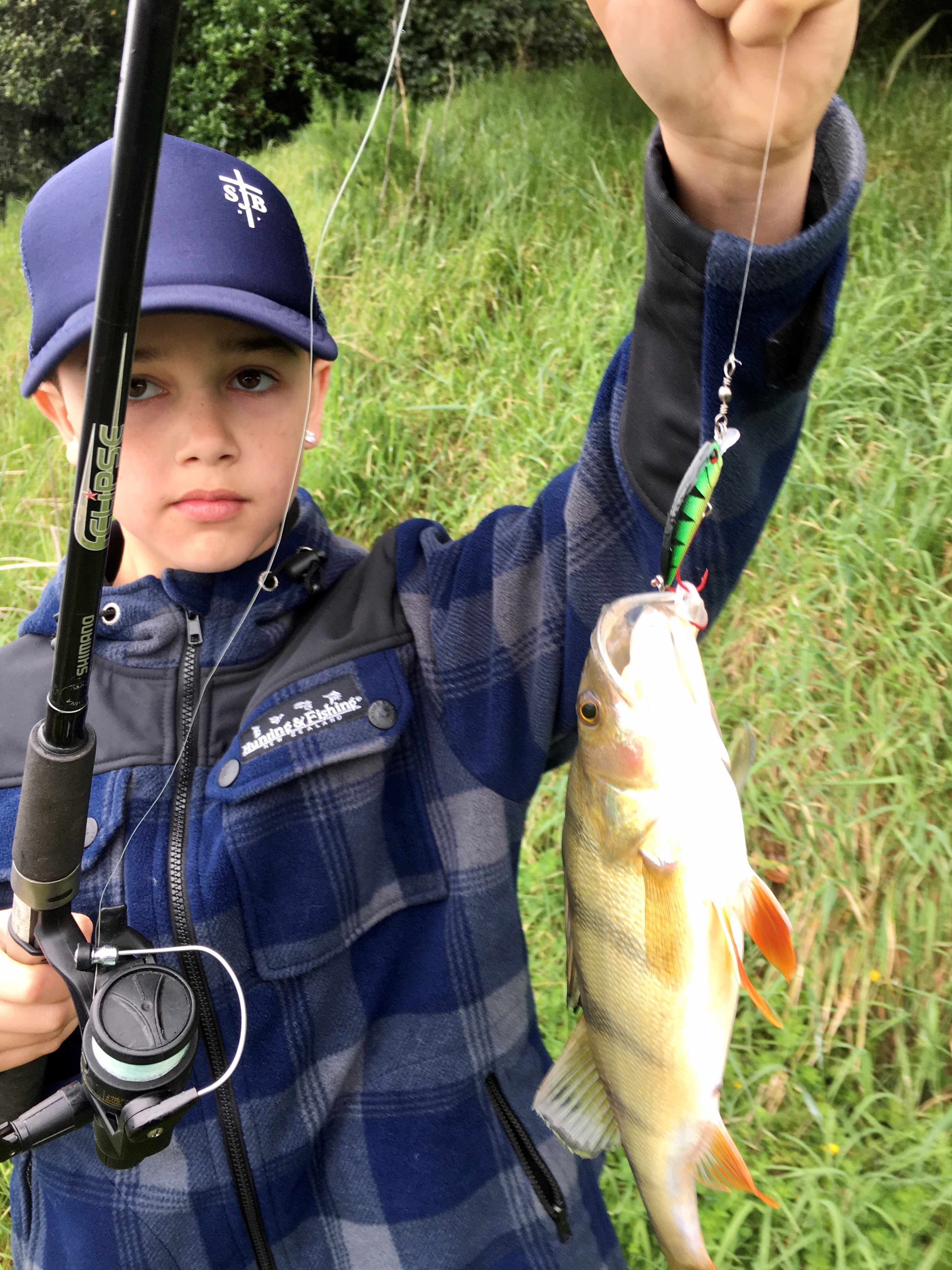 TRL4Nov21. Blake Steele with a nice perch from Lake Rotomanu photo Brad Steele.