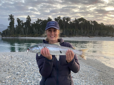 Giverny Penny having success in the lower reach of a South Westland River. Photo Loogan Woodham cropped