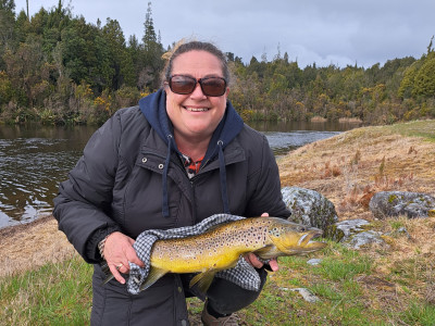 Madeline Castle with her first ever trout. Adrian Brears