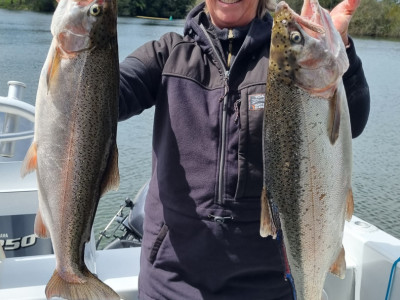 Debbie Oakley with a couple of decent Rotoiti Rainbows for Opening day