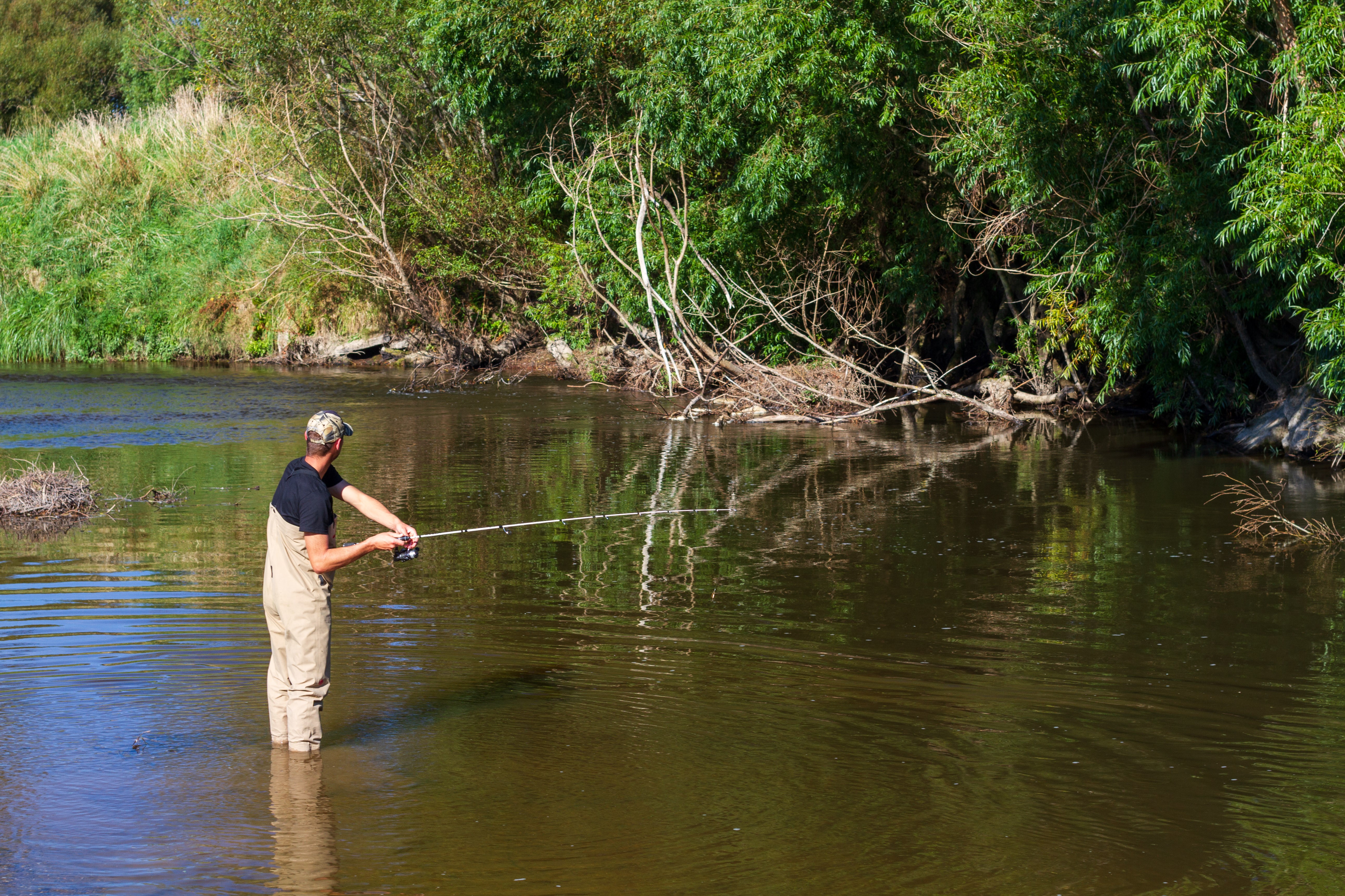 Cohen fishing a pool in the Makarewa takenby Lindsay Withington