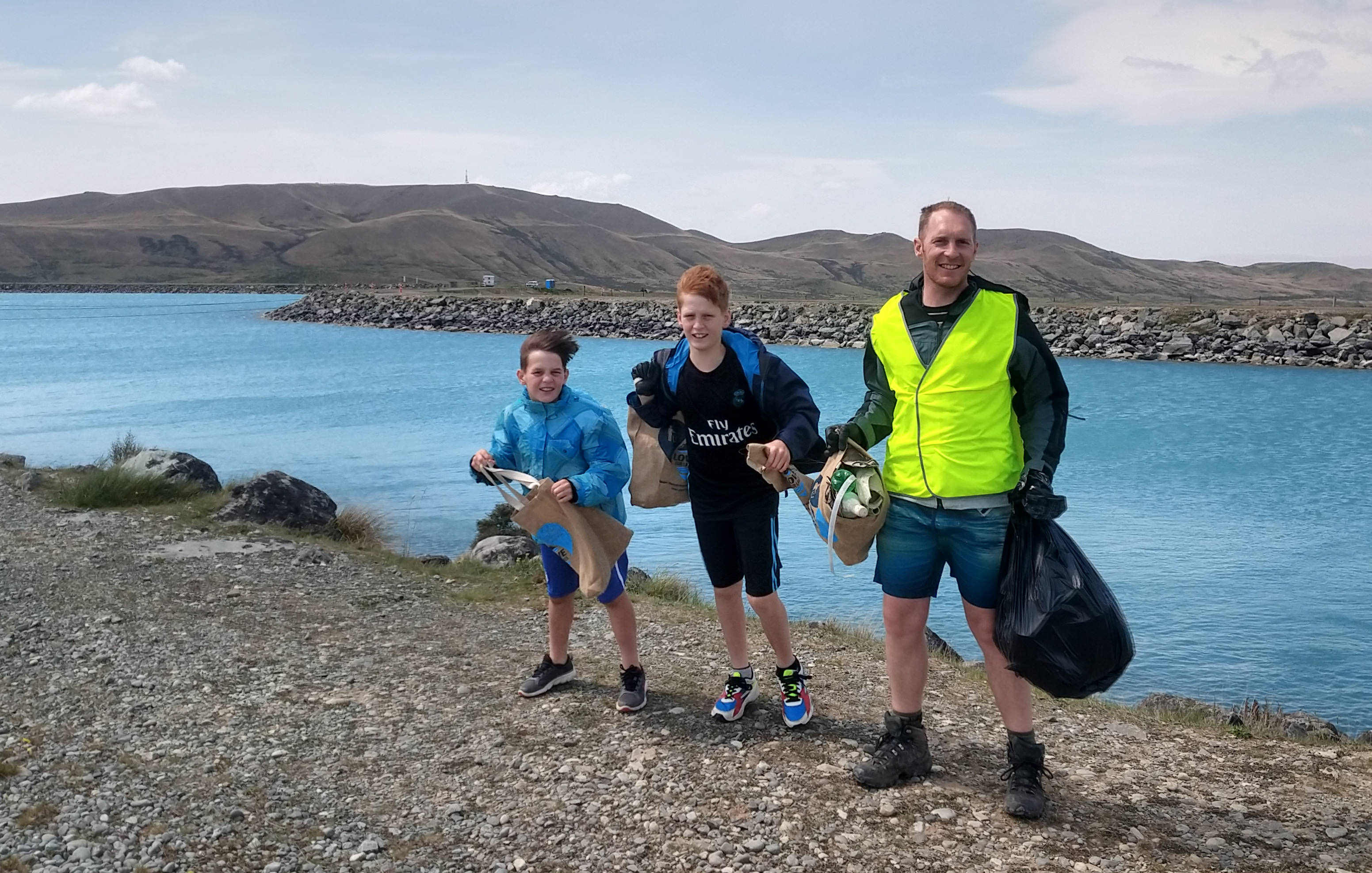 WFR1920.18 Josiah Isaac and Russ Griebe battling the wind and litter at Tekapo Stilling Basin credit J Couper