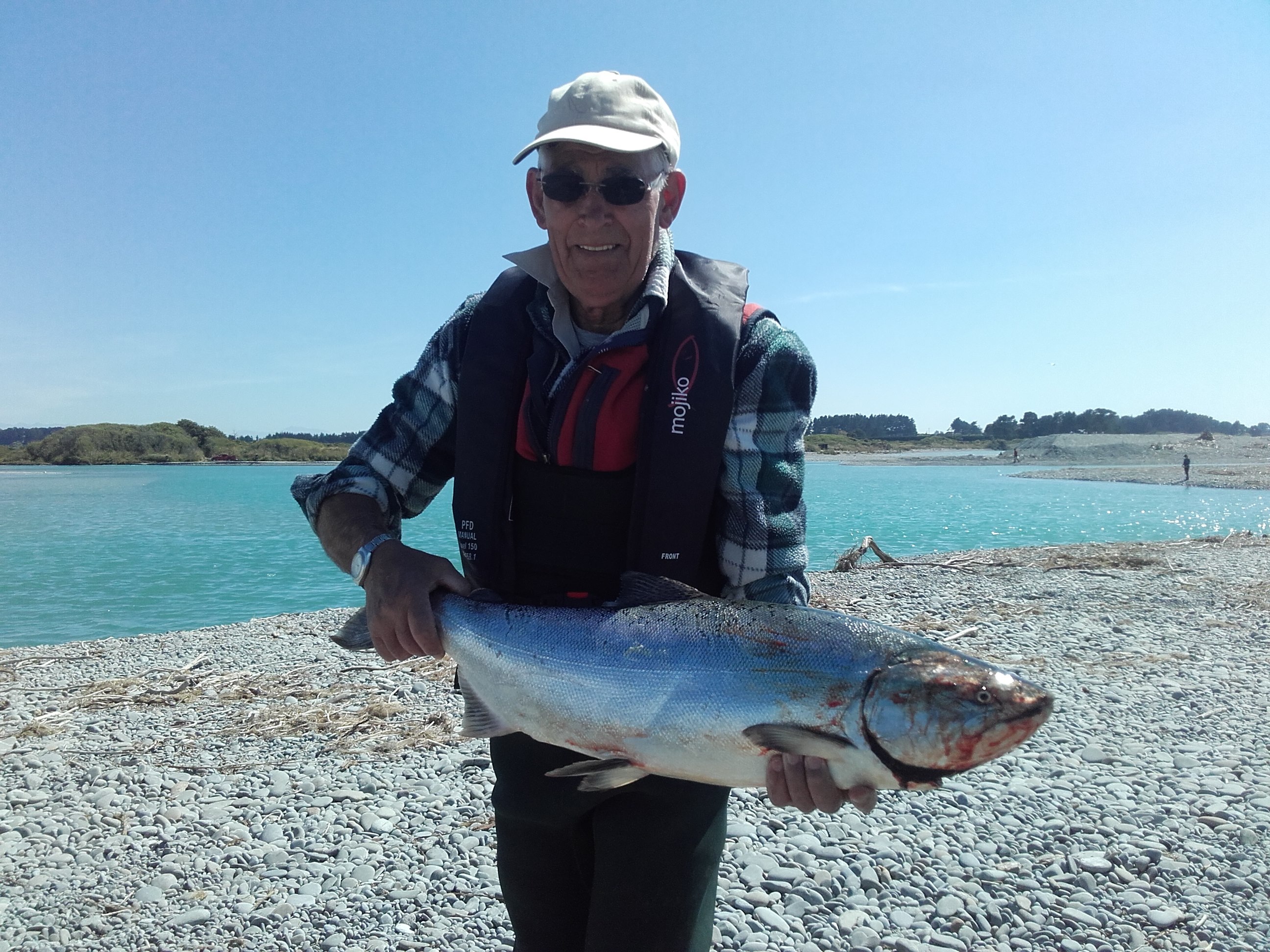 WFR1819.38 Ian Jenkins with his 15lb Rangitata River salmon his first day fishing and first fish of the season credit H Stevens