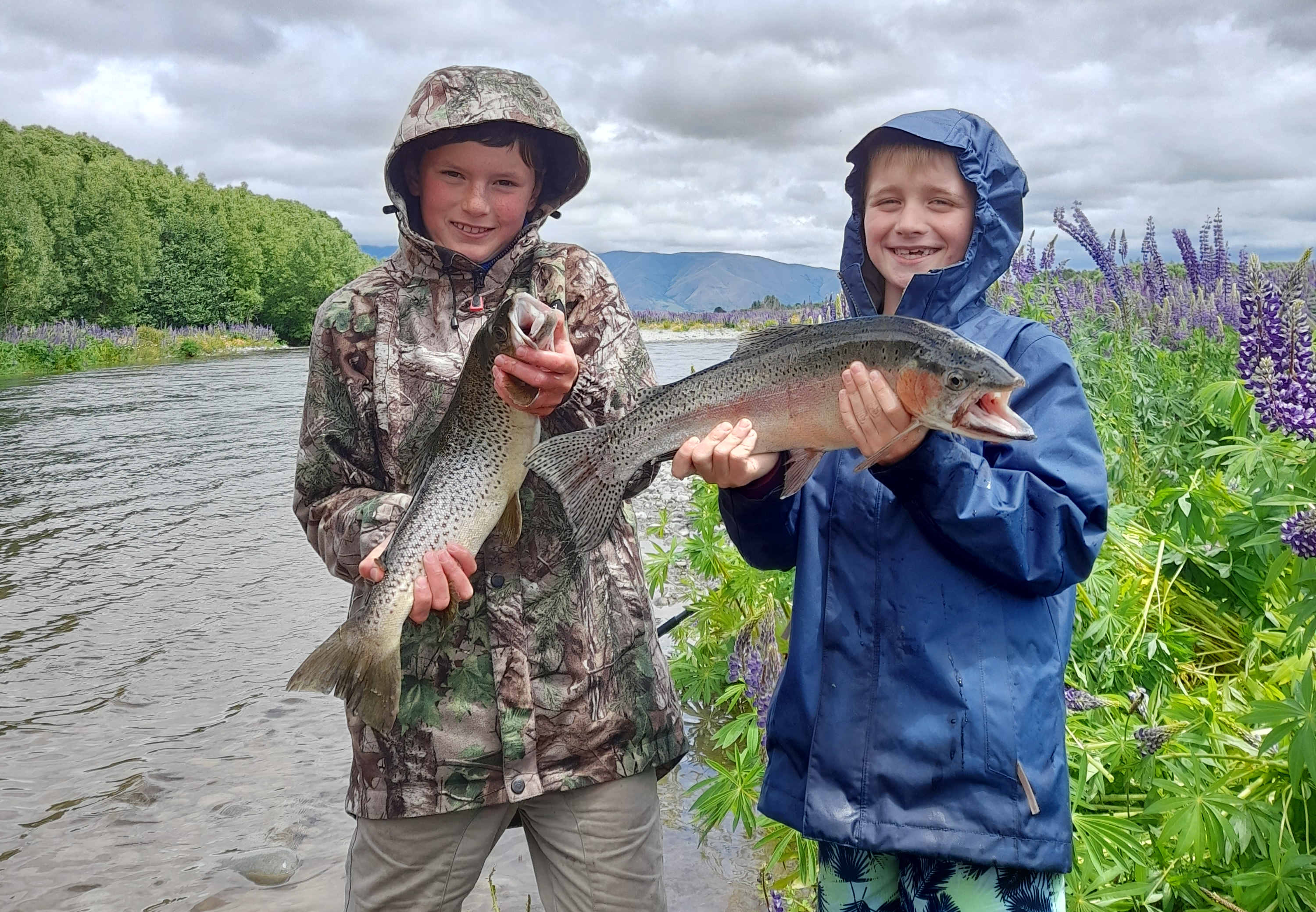 WFR2122.22 Finn Stevens left and Lincoln Skeats with their catches on the Tekapo River credit H Stevens