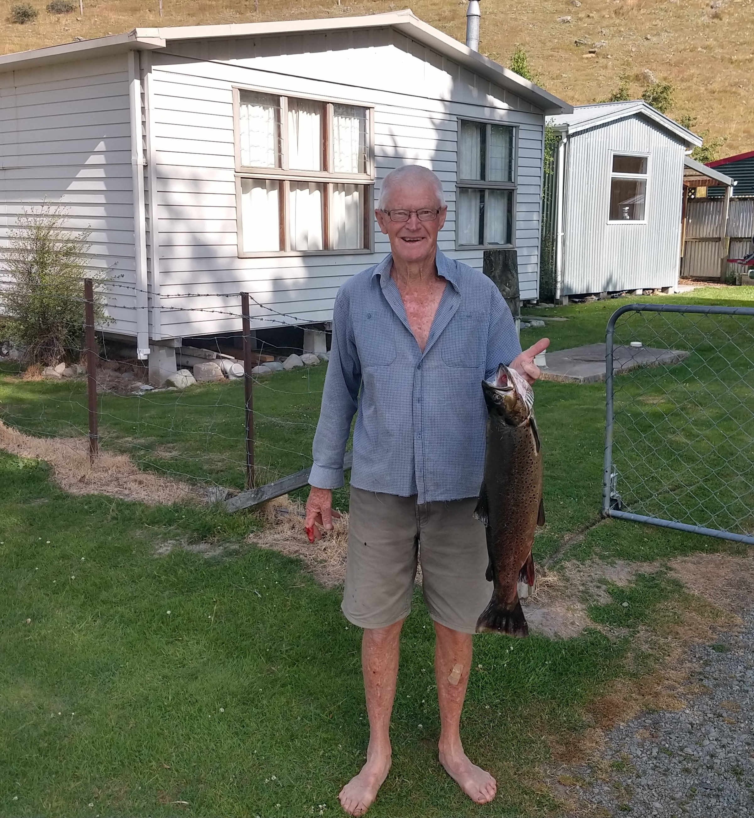 WFR1920.47 Bill Farthing and his third Lake Alex trophy trout Credit J Couper