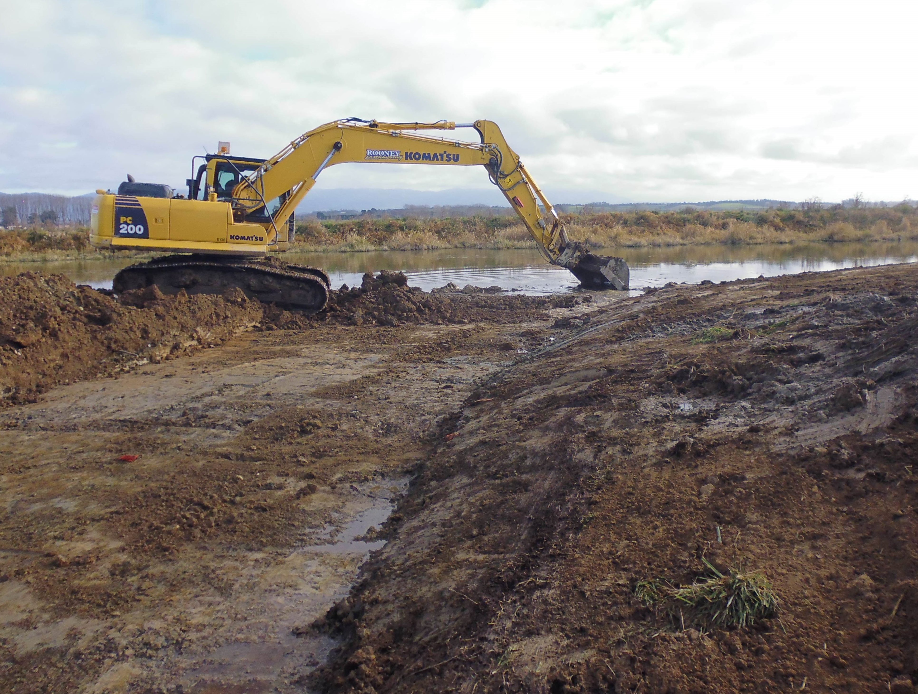 BBjune18CSI2excavating a sill between the dead arm and the wetland 