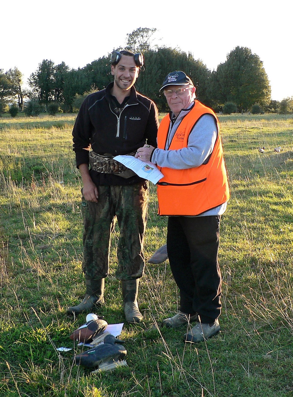 Matty Stokes has his game licence checked by Fish Game Ranger Max Barnard