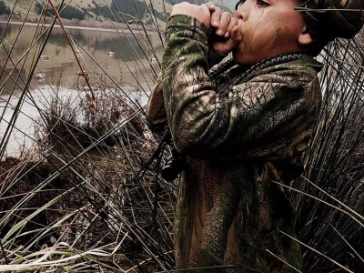 Nixon Martin duck calling on his first hunt with family members.